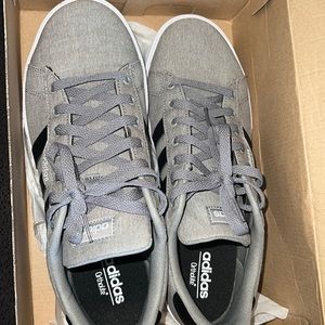 Adidas. Classic design in a sleek gray and white color way. Size 10.5. Used once